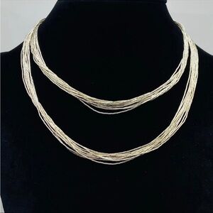 Vintage 28” liquid silver necklace